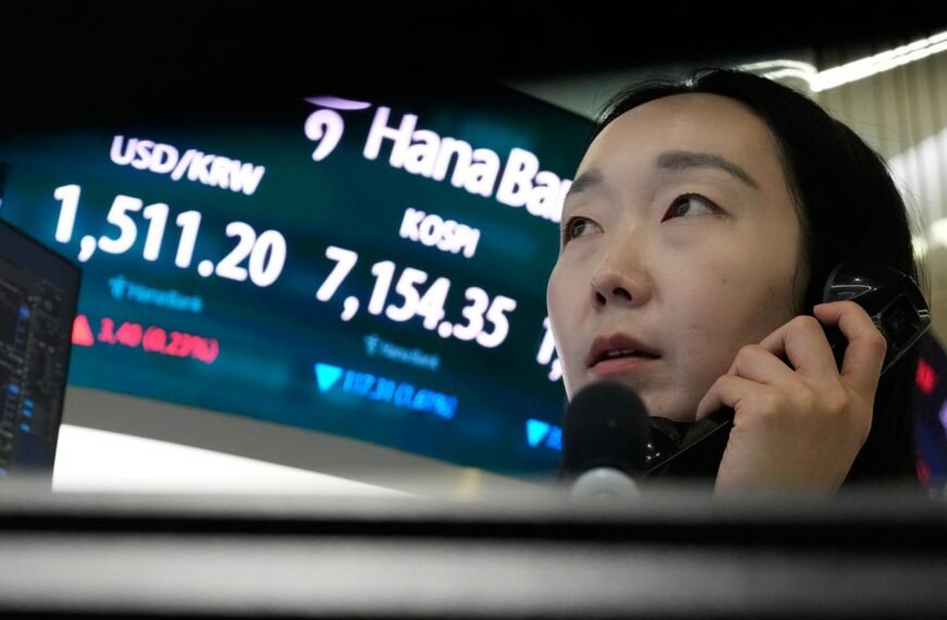 Asian shares surge after oil prices slip and Wall Street resumes its AI rally