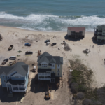 Buxton is moving homes, tearing others down as the ocean closes in