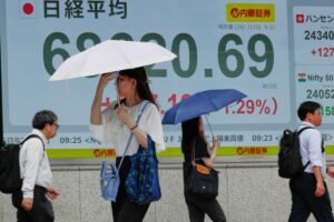 Asian shares are mostly higher and Mideast tensions push Brent crude past $96
